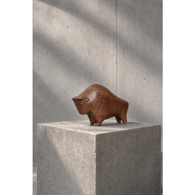 This wooden figurine of a Bison was made in Denmark during the 1960s. Hand-made of high-quality teak wood with clearly...
