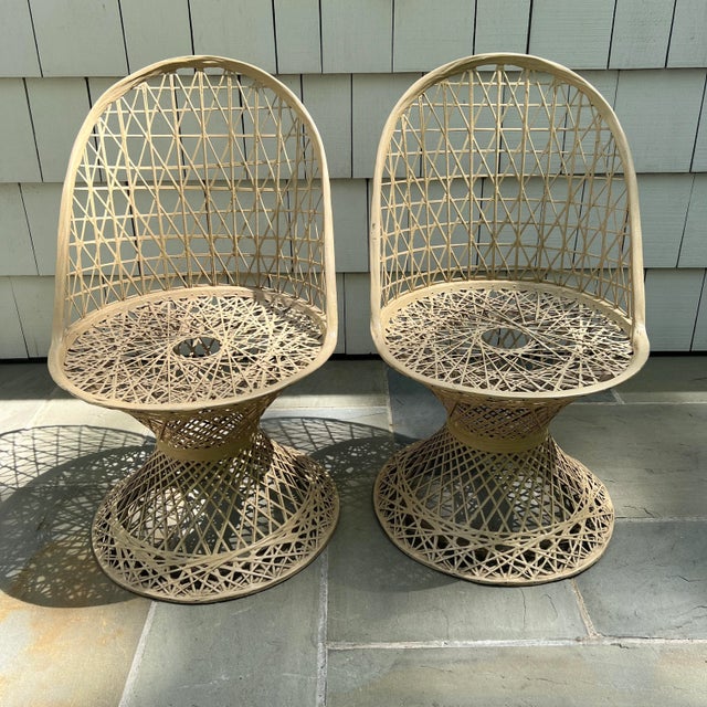 An iconic pair of mid-century modern patio chairs attributed to Russell Woodard. By most online reports this pair is...