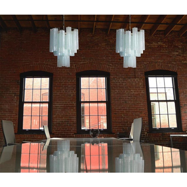 Italian vintage chandelier in Murano glass and nickel-plated metal structure. The armor polished nickel supports 30 large...