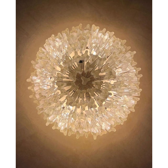 An unusual large dimension Trilobi chandelier by Venini, bearing the manufacturer's mark embossed in the metal structure....