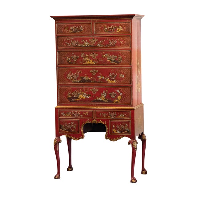 George III period chinoiserie decorated chest on stand in red lacquer with gilt and polychrome decoration. The drawers are...