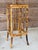 Striking vintage bamboo plant stand featuring beautiful scorched bamboo patterning and decorative Brighton Pavilion–style...