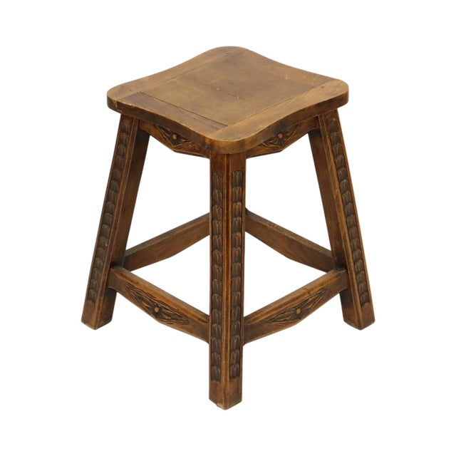 Characterful solid wood stool with 4 legs and sculpted legs featuring patterns and floral decoration, second half of the...