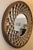 This sculptural 42-inch round lattice mirror features a refined blend of antique gold and soft silver, giving the frame...