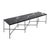Coffee table from Franc. The structure of the table is steel with three x-shaped stretchers. The top is a striking black...