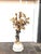 A pair of French 19th century cast bronze putti (cherub) candelabras. The four branch candelabras feature a standing...