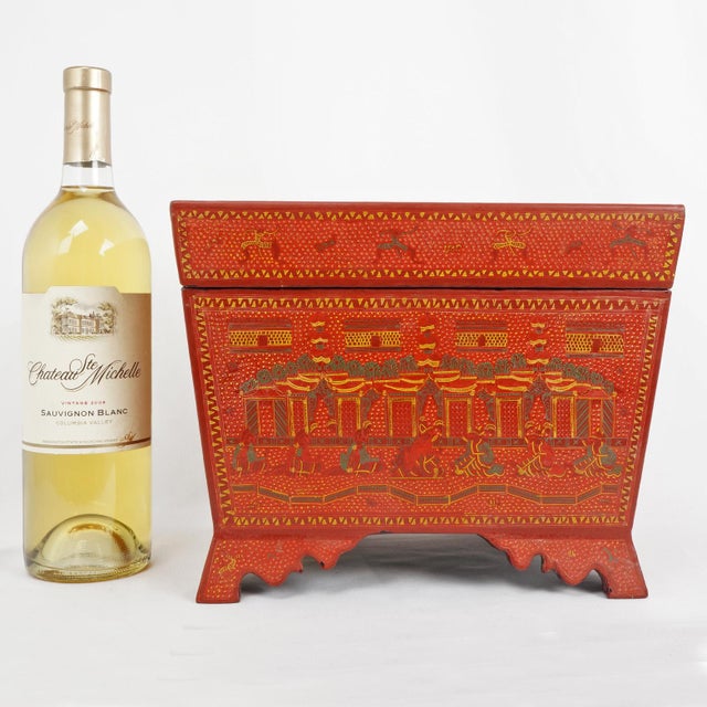 A large, colorful and exotic vintage traditional Burmese/Thai lacquerware box. The rhomboid-shaped box is crafted from...