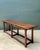 This vintage plank console table by Therien Studios embodies refined rustic elegance through its bold scale and honest...