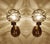 Pair of Vintage sconces by Doria 1970s, brass structure with structured cocoon Murano glass globes with dark sage green...