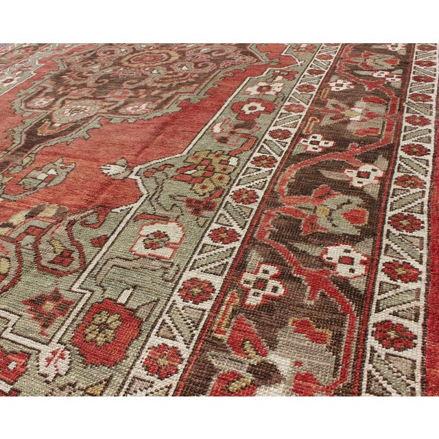 Textile Antique Turkish Oushak Rug With Medallion in Soft Red, Light Green & Brown For Sale - Image 7 of 9
