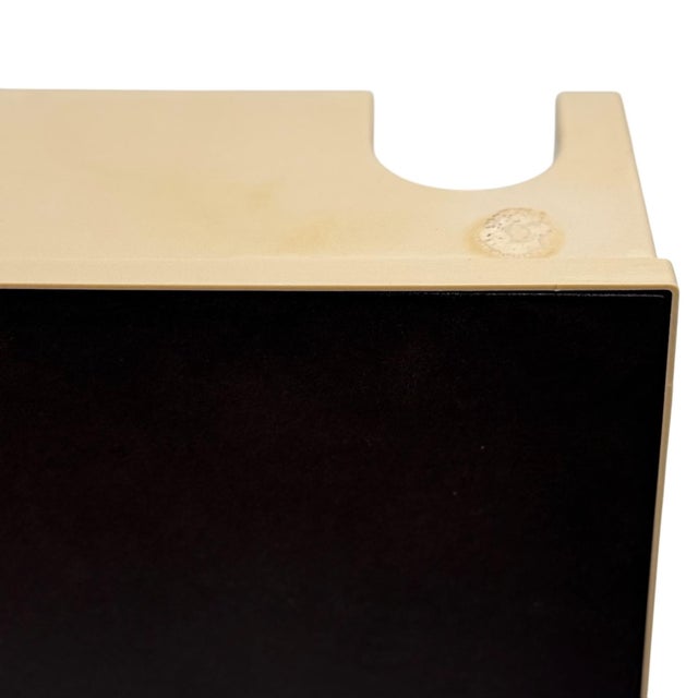 This pair of wall-mounted plastic storage units exemplifies the bold geometry and color play of 1970s Dutch design....