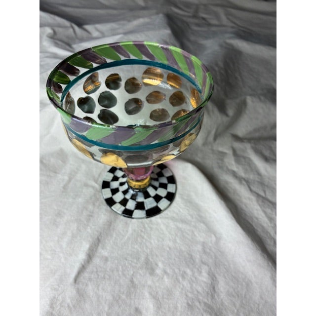 Timeless and traditional, these authentic MacKenzie-Childs Champagne glasses were designed and created by Victoria...