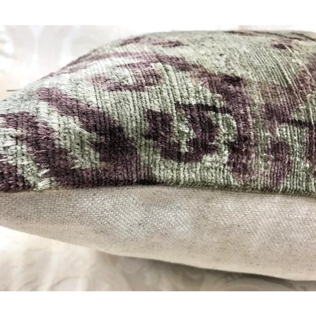 Pair of silk ikat pillows are handmade and dyed by hand in Turkey. This makes each Ikat design one of a kind. Down inserts.