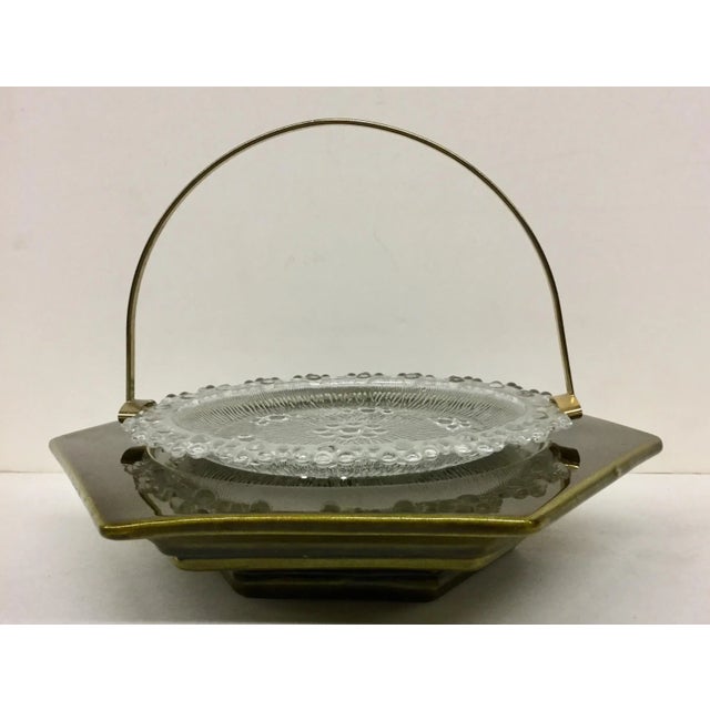 Cool Haeger Ceramic green base which can be used in many ways. The cut glass platter with the gold tone removable handle...