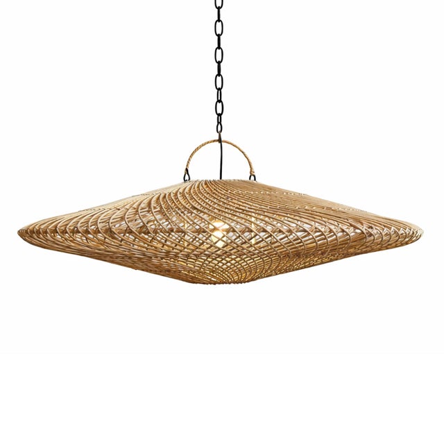 Hand woven wicker discus design pendant light. Height measurement includes the 3" handle at top. Each may vary in natural...
