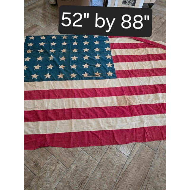 Beautiful worn antique 48 star American Flag. This is cotton and it has definitely been used over time.