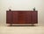 The sideboard was made in the 1970s, Danish production. The structure is covered with teak veneer. Legs made of solid...