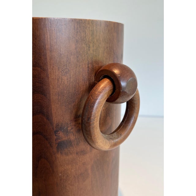 This brutalist umbrella stand is made from wood. The piece has very simple and pure lines. This is a French work. Circa 1950