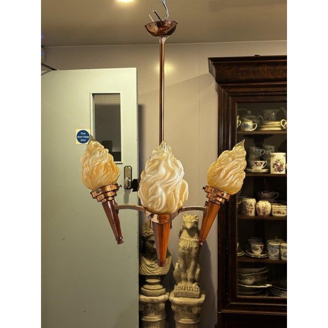 Art Deco Torch Chandelier Sizes :- 64 cms in length, 50 cms wide. See pics for condition, one torch has the tip of the...