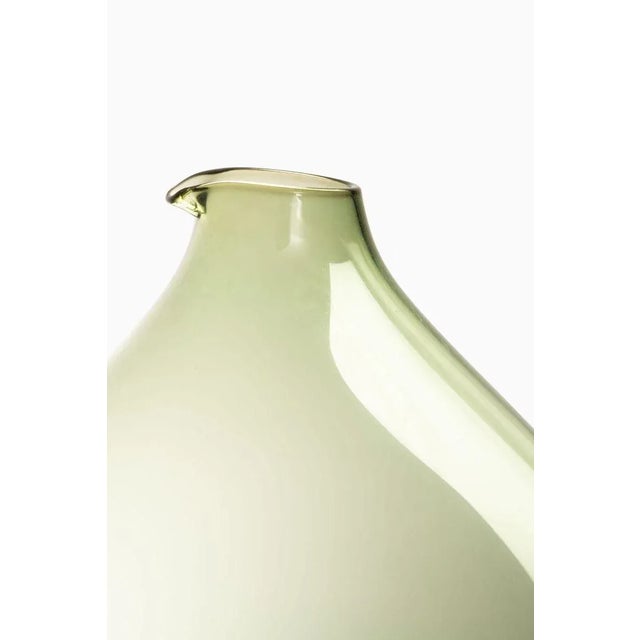 Rare and large glass vase designed by Kjell Blomberg. Produced by Gullaskruf in Sweden. This piece is attributed to the...