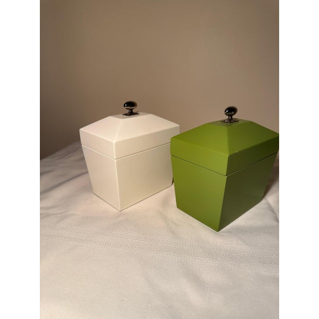 Instantly elevate a console, mantle, or built-in bookshelf with this chic, contrasting pair of lacquered decorative boxes...