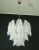 Italian vintage Murano chandelier made by 24 glass petals ''rondini'' (transparent crystal, smooth outside, with crystal...