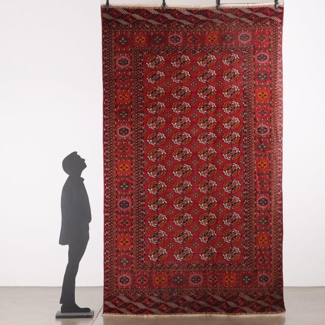 Bukhara wool carpet, fine knot; manual manufacturing. This piece is attributed to the mentioned designer/maker. It has no...