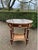 This elegant late 20th-century French Louis XVI–style side table combines richly toned mahogany with finely detailed...