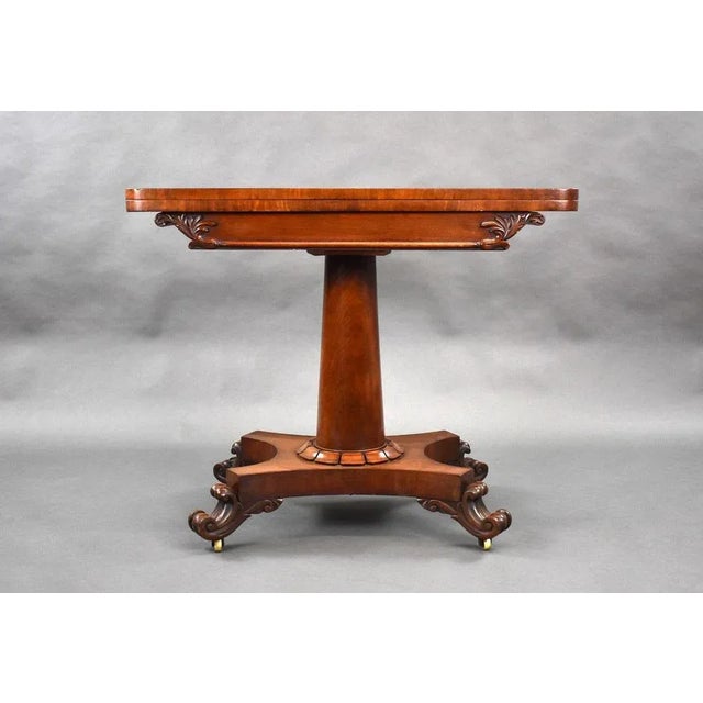 For sale is a good quality William IV mahogany card table, having a folder over top above a cylindrical stem, the table...
