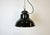 Industrial black enamel pendant light made by Elektrosvit in former Czechoslovakia during the 1960s. White enamel inside...