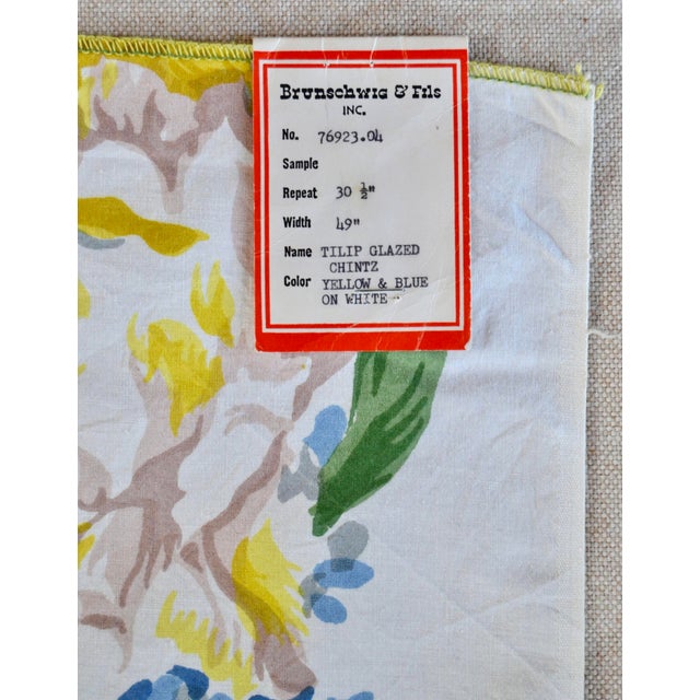 A beautiful traditional large floral design in cheerful yellow, blues, greens and off white printed in France in the...
