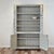 Dimensions: 15"D x 50.25"W x 78.5"H Upper Shelves: 12"H x 13.5"D x 48.25"W 10"H x 13.5"D x 48.25"W 9.75"H x 13.5"D x...