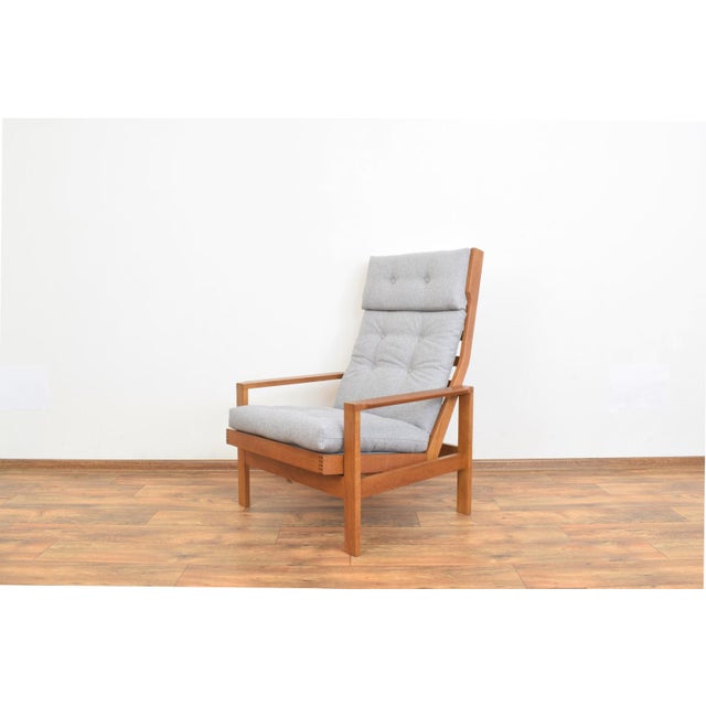 This armchair was designed in 1966 by Danish designer Leif Alring for Madsen & Schubell. The armchair frame is made of...