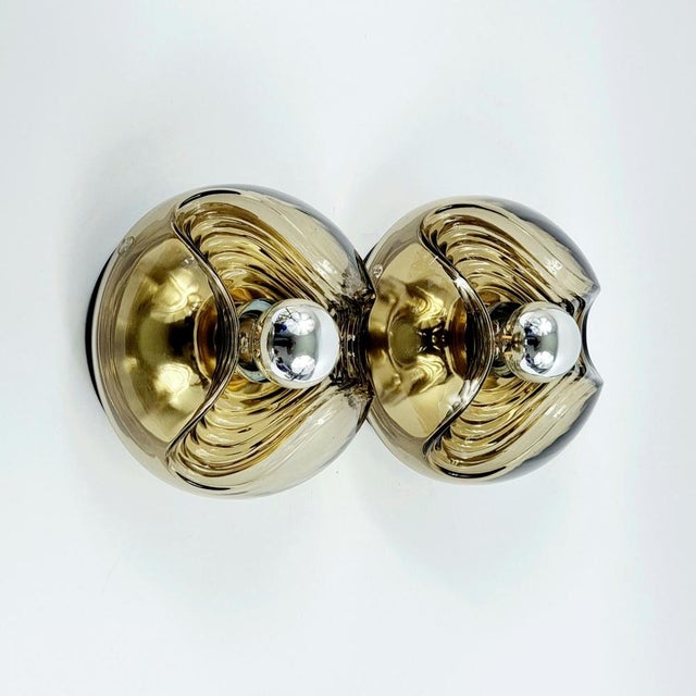 Stunning pair of wall lamps/sconces "wave" model (also called "futura") designed by koch & lowy for peill & putzler,...