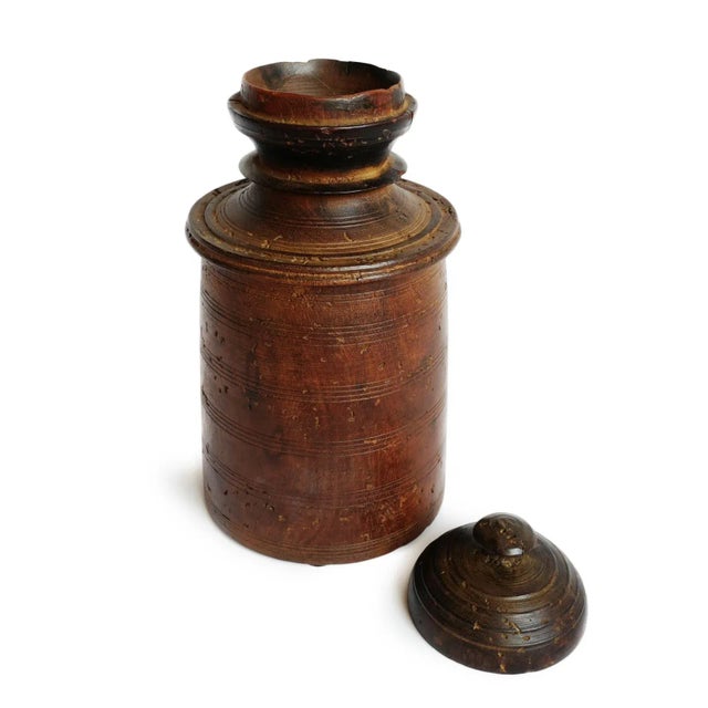 Beautiful old wood container from the Humla Mountain People of Nepal. These hand made utilitarian pots were used for every...