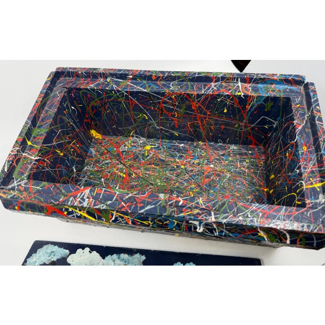 A nice folk art hand made and hand painted homage to Jackson Pollock in a drop style. It is monogrammed TJ on the interior...