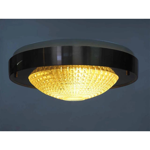 B-1043, a unique ceiling light by raak amsterdam (the netherlands). This lamp’s design dates to 1968. The b-1043 is an...