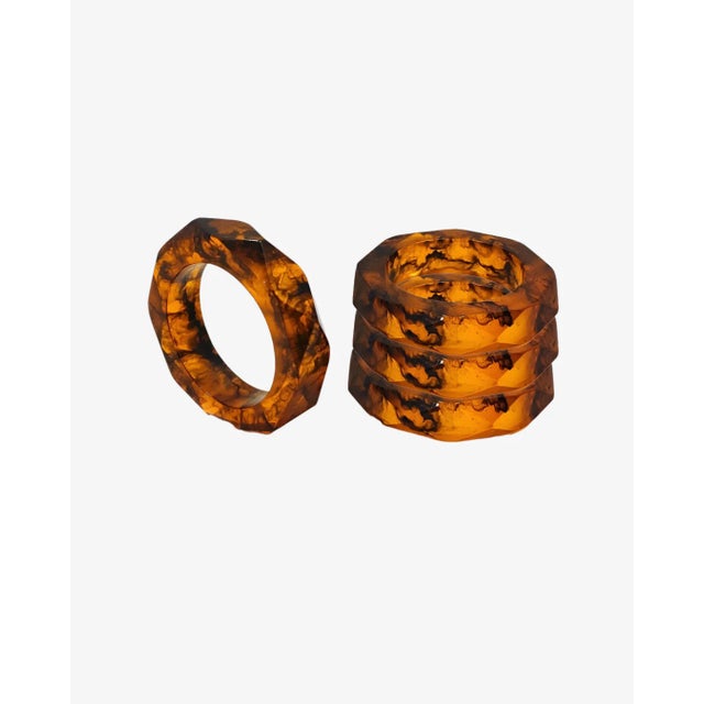 Designed to echo the sleek geometry of our Prism Flatware, the Prism Napkin Rings in Tortoise brings warmth and dimension...