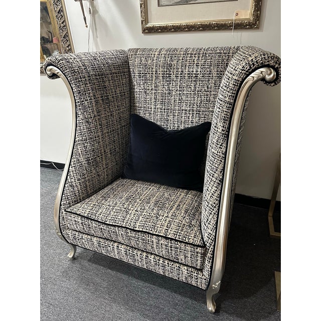 Over the top, pair of Christopher Guy “ VERNIER” arm chairs. Silver wood, herringbone velvet, loose cushion and black...