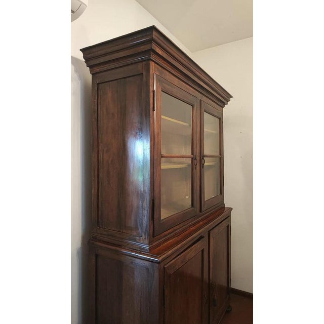 display cabinet from the 19th century This piece is attributed to the mentioned designer/maker. It has no attribution mark...