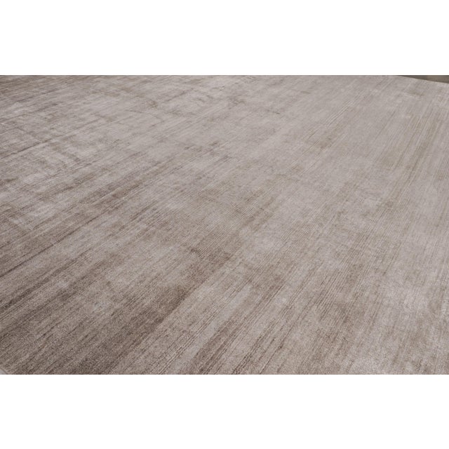 A 11x22 oversized bold new addition to our Texture of Color collection, made with hand-knotted sari silk and cotton. On...