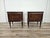 An elegant pair of vintage oak nightstands dating back to the 1960s, characterized by refined decorative taste and...