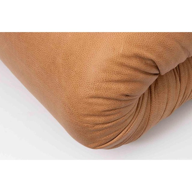 Outstanding set of 4 "pagrù" leather Armchairs, realized by Claudio Vagnoni for P1 in 1969. Manufacturer's label....