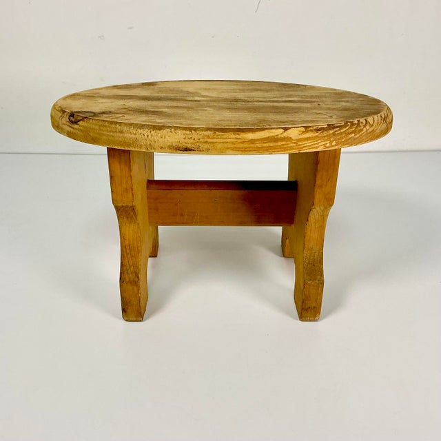 This is an Americana handmade Folk Art Pine step or Footstool. It has an oval top with a trestle support. Left in its...
