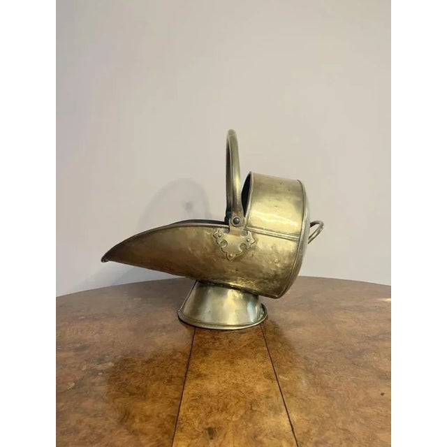 Wonderful antique Victorian brass coal scuttle and shovel having a quality brass coal scuttle with a swing handle to the...