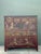 This monumental antique cabinet is a masterpiece of East Asian storytelling and artisanal craftsmanship. The facade is...