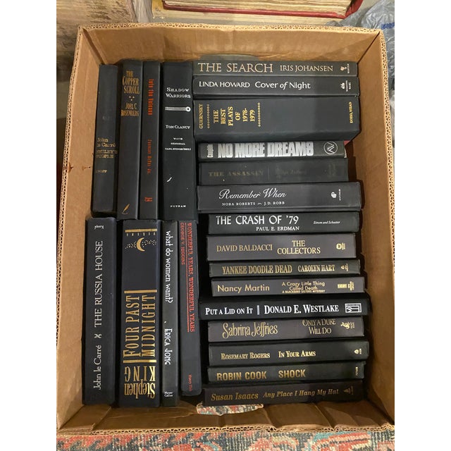 A set of 10 vintage books that range from colors of black, author, year published that include a variety of literary...