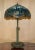 An exceptional and legendary find: a lovely, original, fully stamped Tiffany Studios New York bronze height-adjustable...