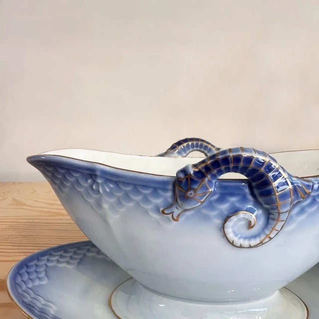 Introducing the Bing and Grondahl Porcelain Gravy Boat (Model 311), a captivating piece of Danish ceramic art from the...