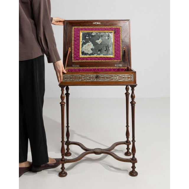 Inlaid walnut side table in Rich Walnut Brown. The rich walnut brown surface highlights brass-inlaid top, cross-stretcher...